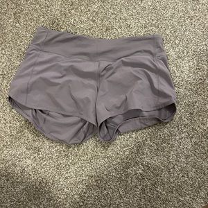 Purple lulu lemon shorts. 4 inch inseam